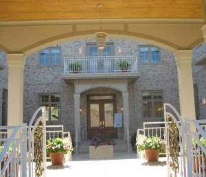 You enter the house from the side courtyard.