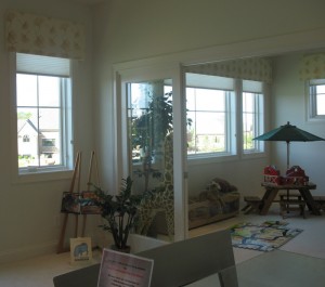 This upstairs lounge was surrounded by a playroom and the children's bedrooms that all had windows looking into it.