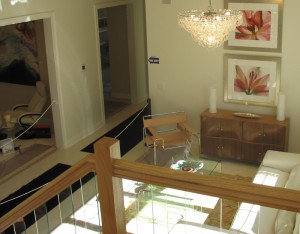 The view of the living room from the stairs.