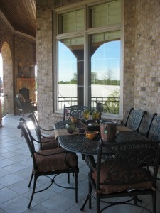 Covered porch that runs along the back of the house.