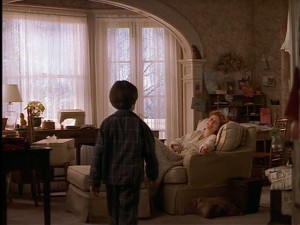 Ben goes into his mom Jackie's bedroom on Christmas morning.