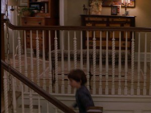 As Ben goes upstairs, we get a glimpse of the upstairs hallway.