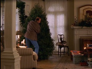 Luke brings Jackie a Christmas tree.