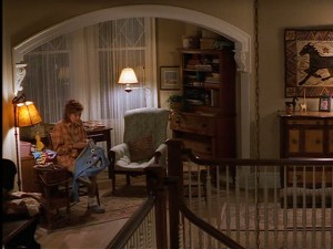 Love this little nook under the arch on the upstairs landing.