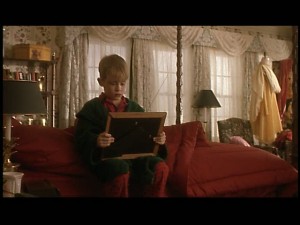 Kevin in his parents' room, wishing they'd come home.