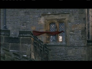 Jane sees a red scarf waving from a window in the North Tower.