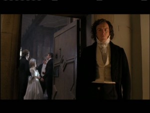Rochester confronts Jane in the back hall, asking her why she has left the party.
