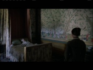 Visiting her aunt, Mrs. Reed, on her death bed. I thought the murals on the walls were interesting.