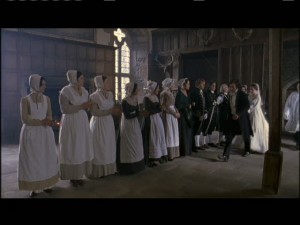 The servants line up in the front hall to congratulate the newlyweds and throw rice at them. Rochester says, "Save your congratulations! You're 15 years too late!"