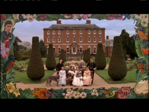 Final shot in the movie, of Jane and Edward with their two children, extended family, and friends, in front of their new home.