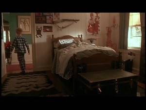 Kevin's brother's bedroom. That gun on the wall's gonna come in handy!