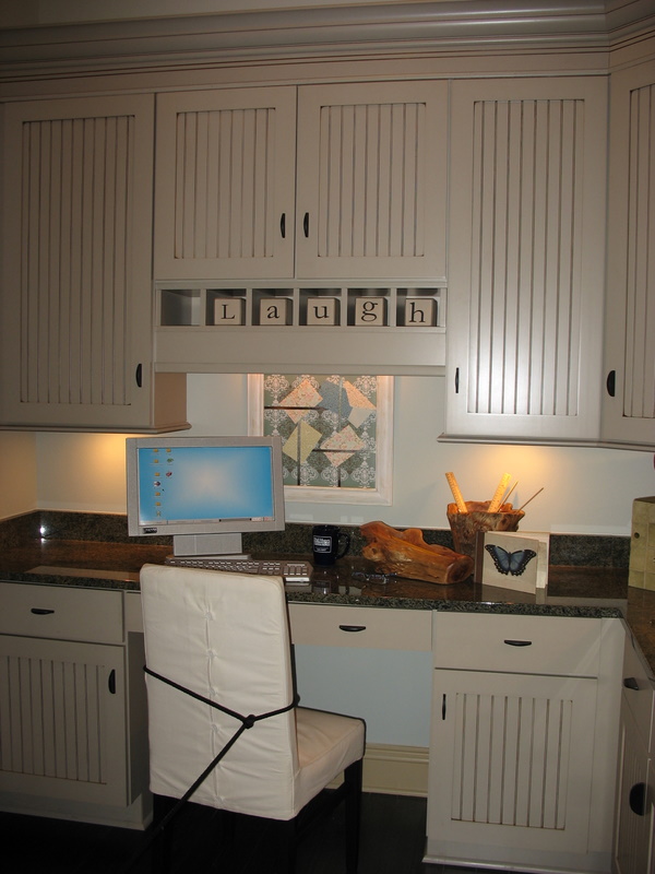 A computer/work station in the back hall by the mudroom.