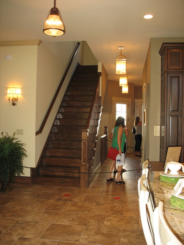 The back staircase leading up from the kitchen.