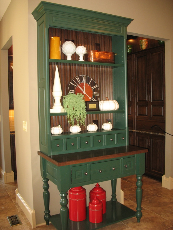 This may look like a free-standing hutch, but it was actually part of the kitchen wall.