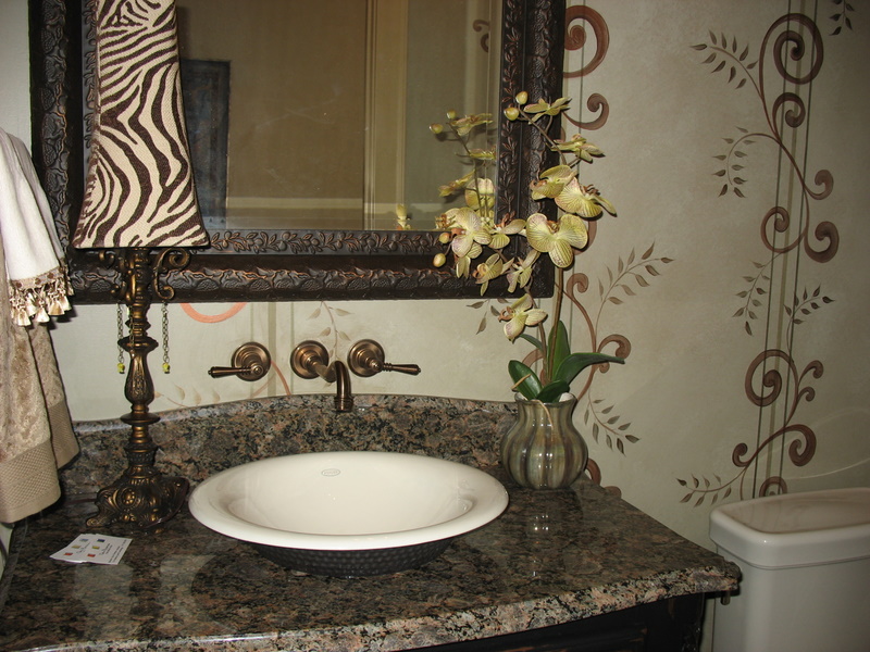 Powder room had hand-painted walls that looked like wallpaper.