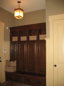 Mudroom off the back door had built-in storage and a bench.