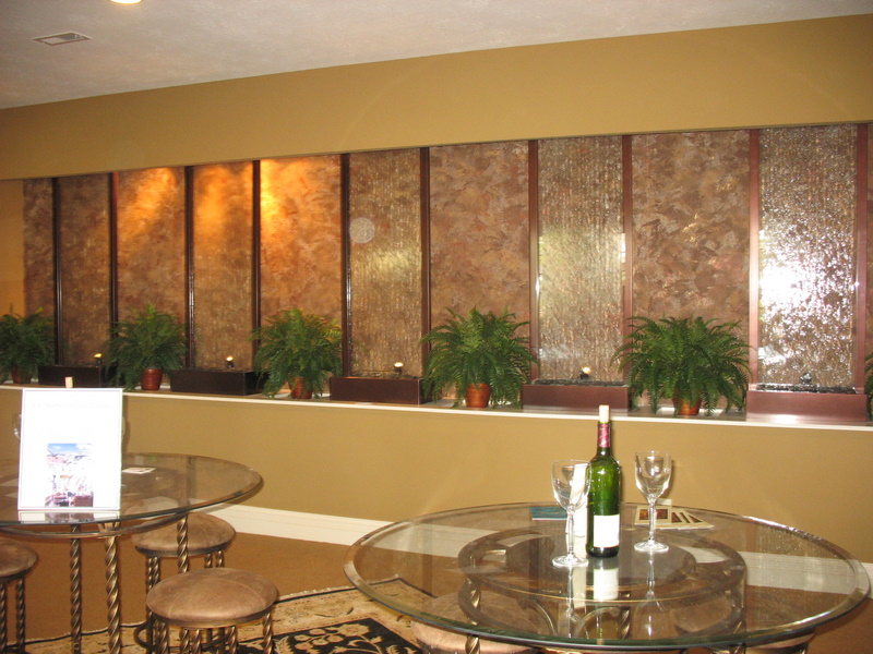There was an entire wall in the lower level that had this fountain on it, and there were several round tables with chairs set up. You felt like you had stepped into a cafe or something.