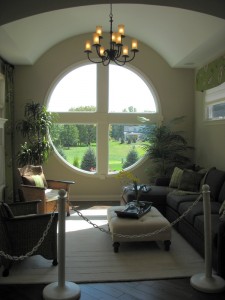 Striking round window in the hearth room off the kitchen.