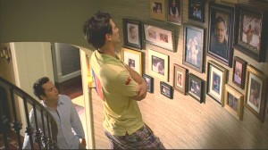 A closer view of the photos in the stairwell.