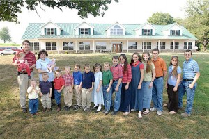 Duggar Family in front of Arkansas house Duggar Family in front of Arkansas house
