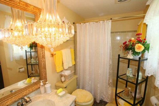 bathroom with giant chandelier bathroom with giant chandelier