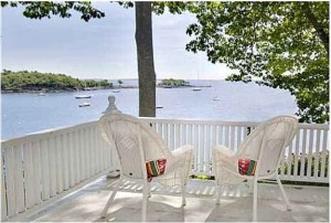 wicker chairs overlooking harbor