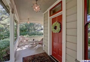 close up of red front door and front porch-cottage