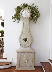 hall clock with greenery