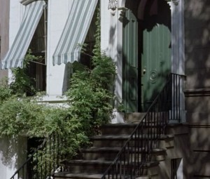 green door and striped awnings Breakfast at Tiffanys