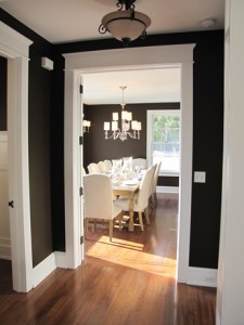 looking into black-painted dining room