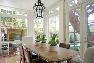 sunroom with farmhouse table