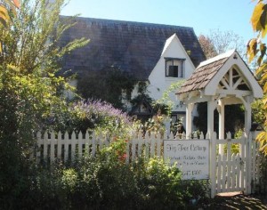 Fig Tree Cottage sign on fence