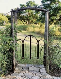 rusted headboard turned into gate
