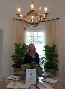 oval foyer with brass chandelier