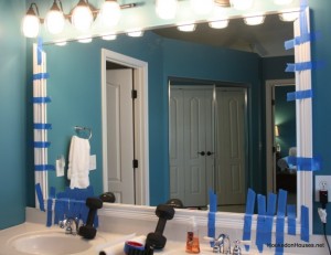 framing a plate glass bathroom mirror with moldings