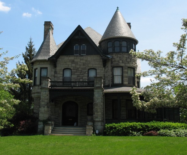 large stone house with turret