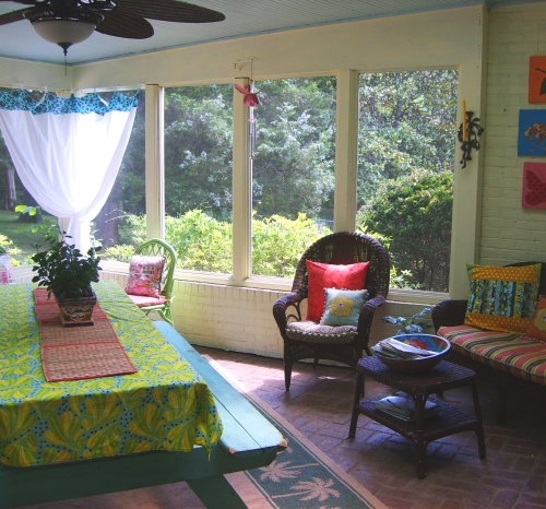 screened porch with picnic table