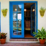 french doors painted bright blue
