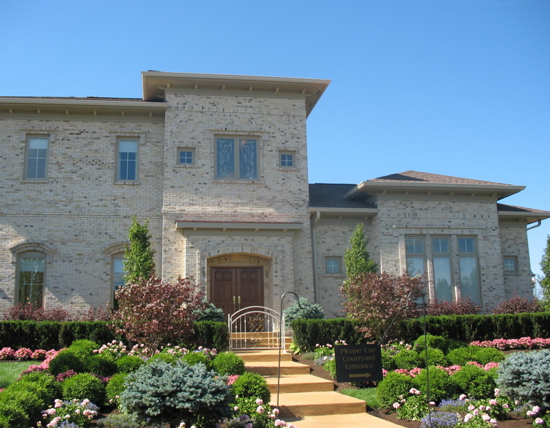 exterior front of large brick house