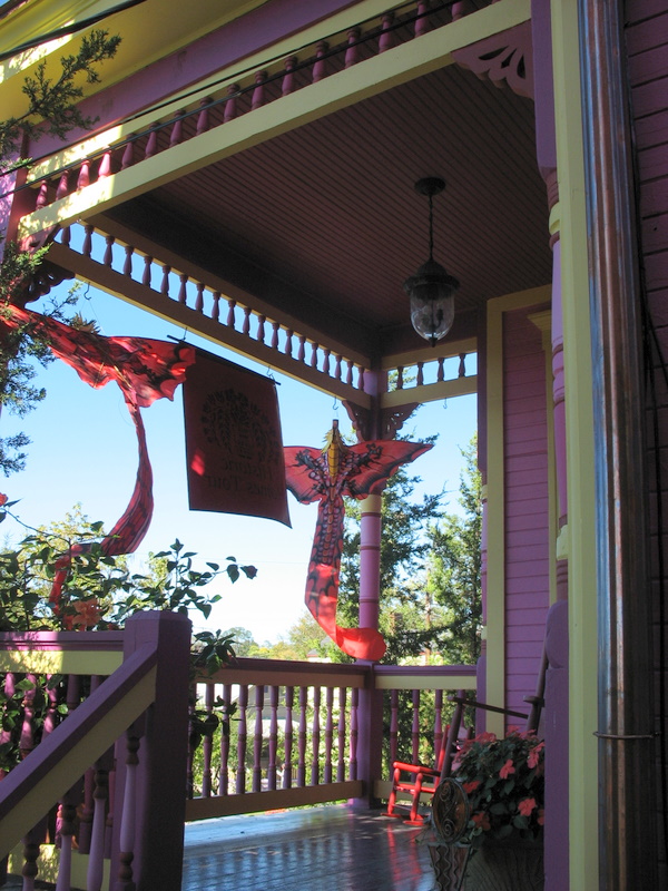 front porch of bright pink house