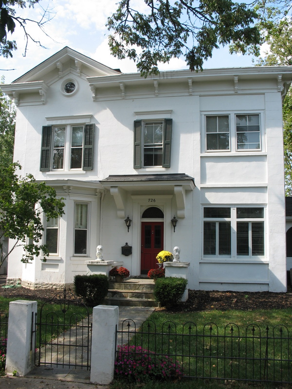 white house with shutters