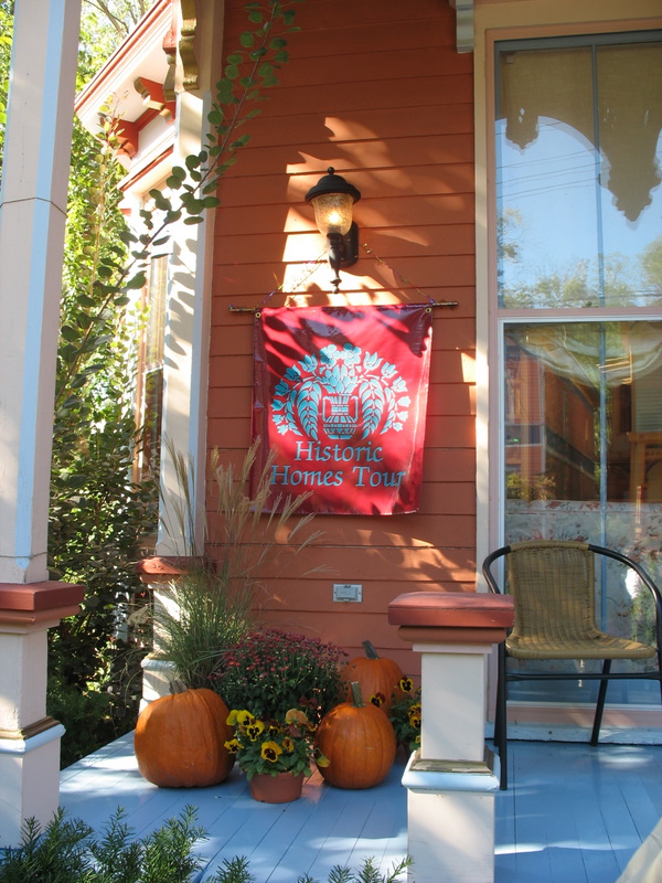 front porch with pumpkins