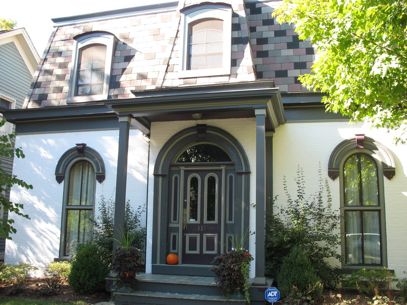 old house with gray door