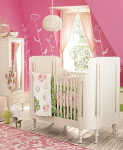 pink nursery with crib