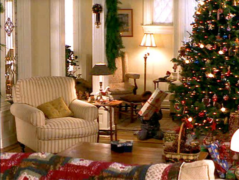 A living room filled with furniture and a christmas tree