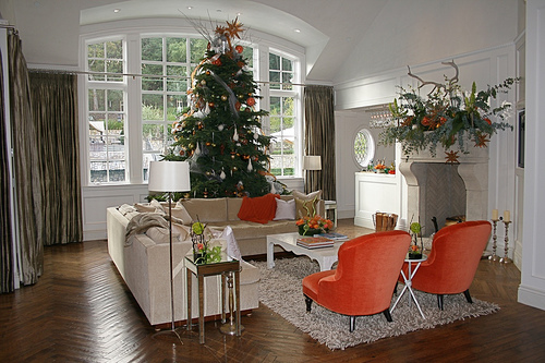 A living room filled with furniture and a large window