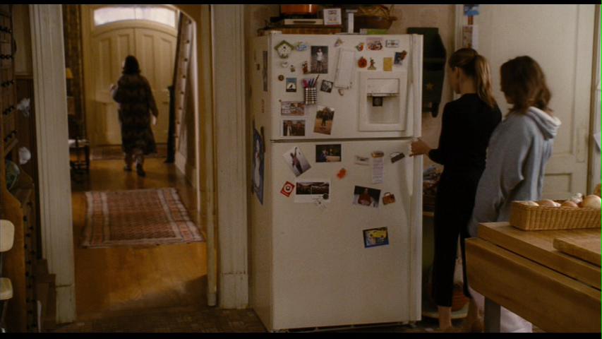 The set designer says she carefully chose every magnet and photo for the fridge to make it look like a real family lived there.