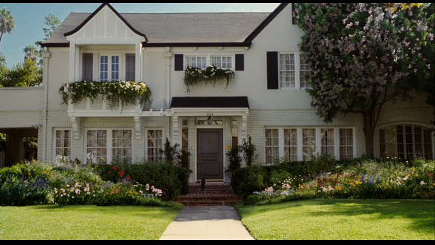 house at the end of the movie Bewitched with shutters and flower boxes