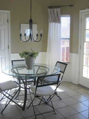 A room filled with furniture and a large window