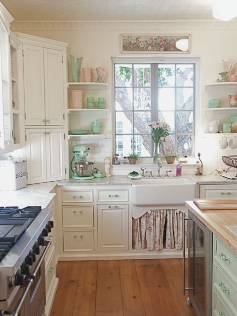 Brooke Giannetti\'s white kitchen with Jadeite collectibles